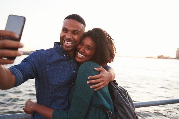 Black Couple Taking a Selfie